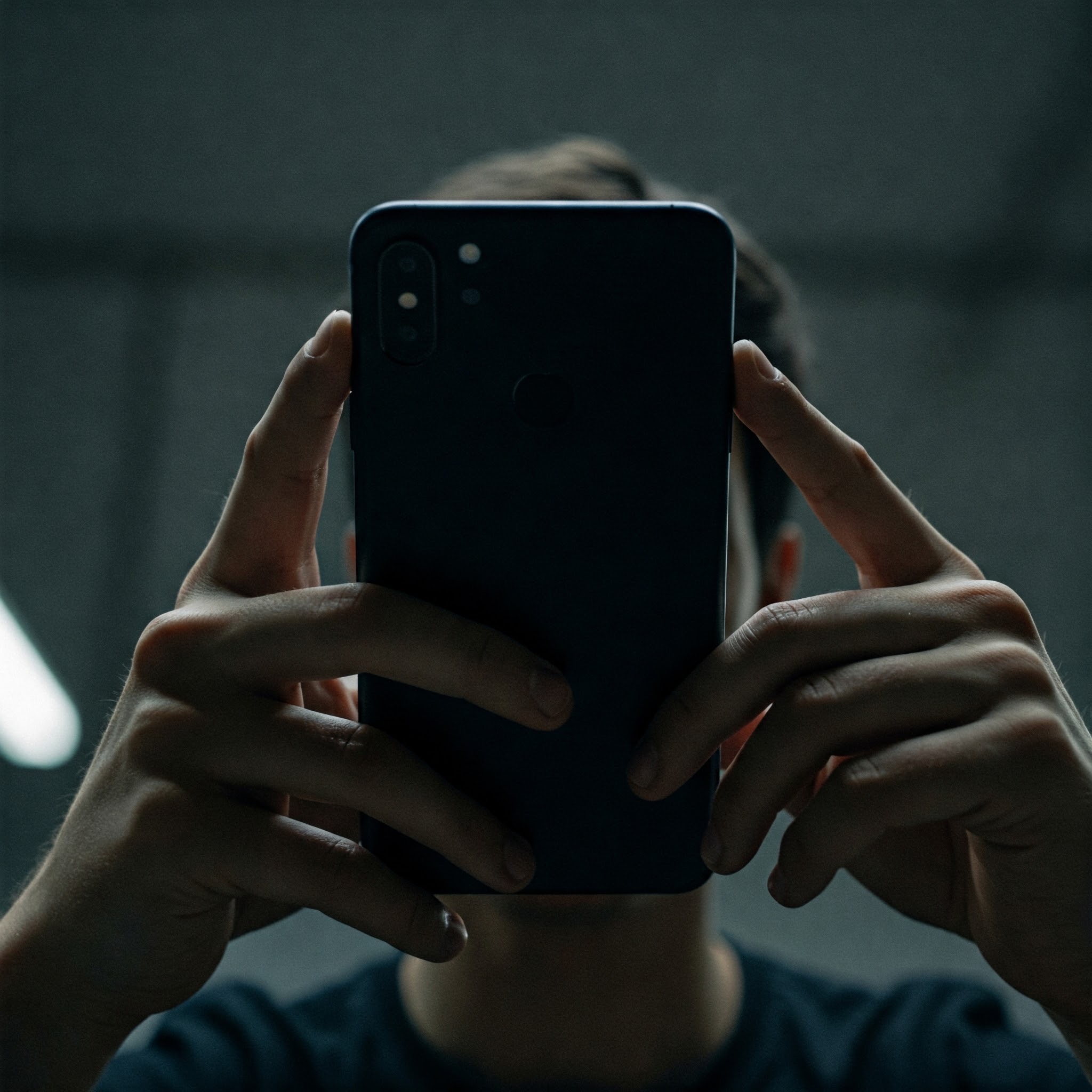 photo of Person Holding Smartphone